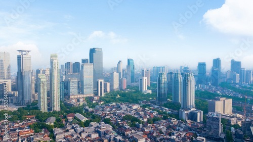 Urban buildings at misty morning in Jakarta