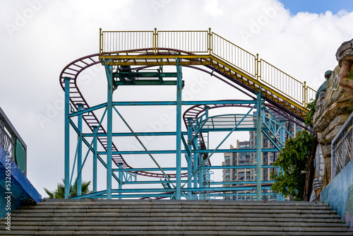 Close-up of roller coaster track in an amusement park