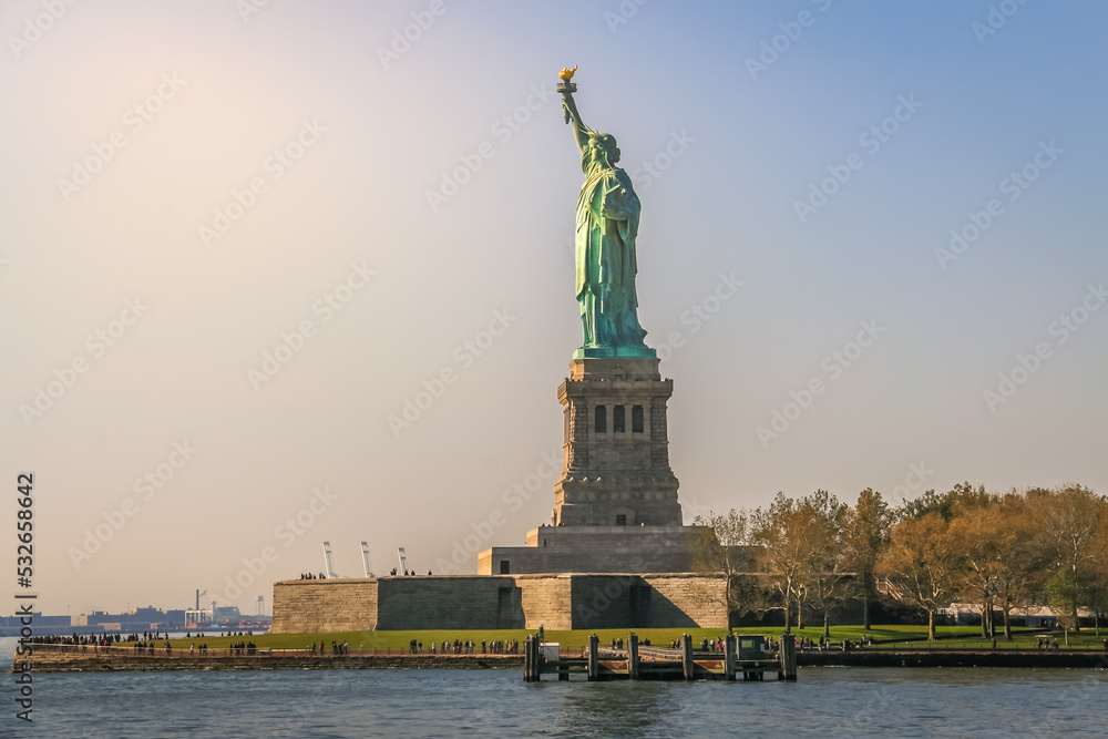 Statue of Liberty and clear sky at sunset, New York City, United States