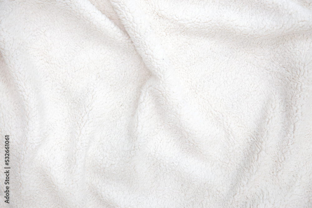 White cotton blanket. White wallpaper
White cotton blanket. White wallpaper