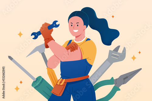 Woman mechanic holding tools