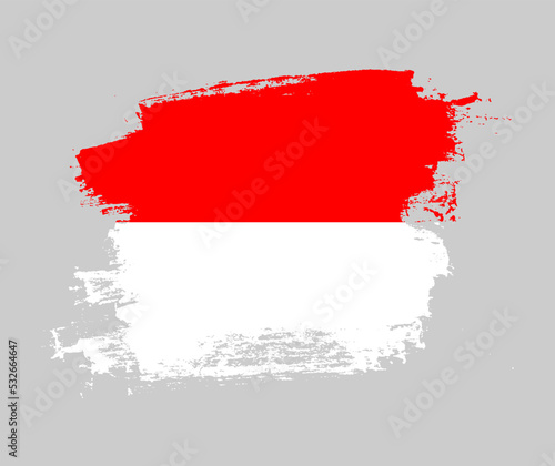 Artistic Indonesia national flag design on painted brush concept