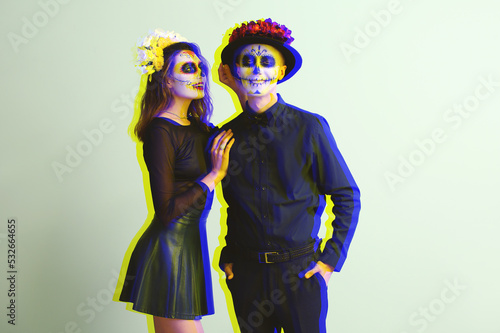 Young couple with painted s...