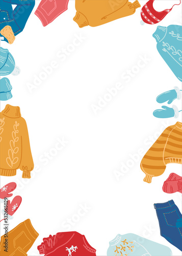 Frame with winter clothes elements for seasonal design. Design template with jacket, jeans, sweaters, hat and mittens. Flat style. Vector template.
