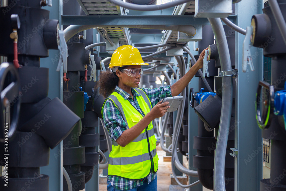 Engineer under industrial inspection Large water heaters are used in high-rise condominiums.
Engineer under industrial inspection Large water heaters are used in high-rise condominiums.