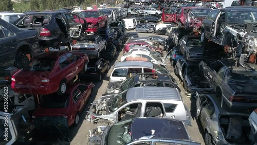Wallpaper Mural Top View of a Crane Crashing Scrap Metal Cars in a Junkyard Torontodigital.ca