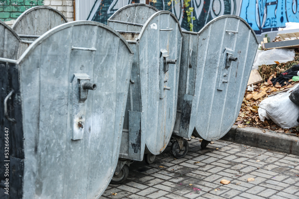 Metal garbage container outdoors Metal garbage container outdoors