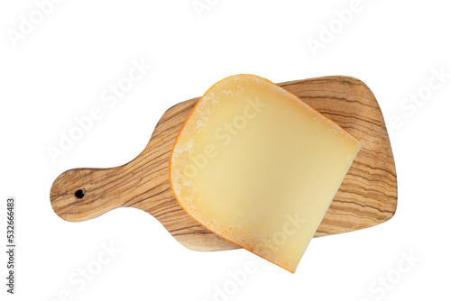 Tableau sur toile morceaux de gouda sur une planche à découper en gros plan