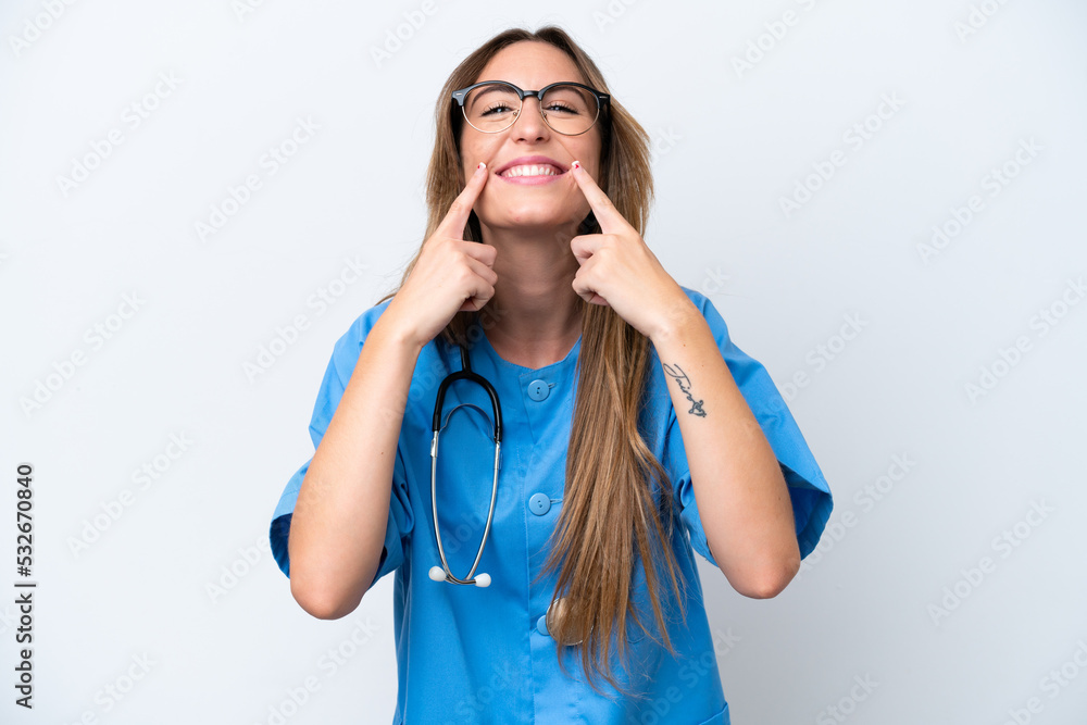 Young surgeon doctor woman isolated on blue background smiling with a happy and pleasant expression Young surgeon doctor woman isolated on blue background smiling with a happy and pleasant expression