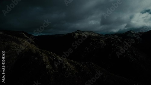 Aerial Mountain Clouds at Night. Beautiful Nature Landscape from Portugal 4k. Nature Background. Mountain Top at Moonlight. photo