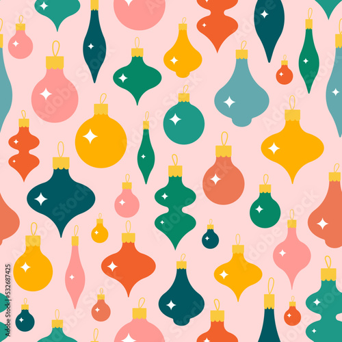 Christmas bauble seamless pattern on pink background. Cute flat Xmas tree balls with tiny sparkles. Perfect retro print for fabric, wrapping paper or cover.