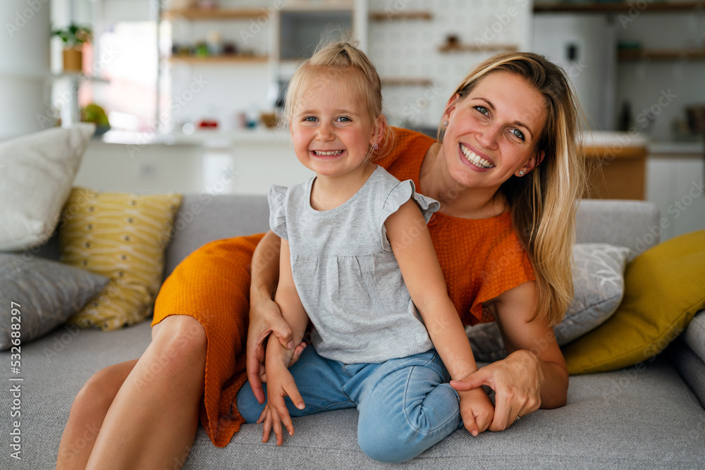 Love family parenthood childhood concept. Beautiful mother and her kid playing together at home Love family parenthood childhood concept. Beautiful mother and her kid playing together at home
