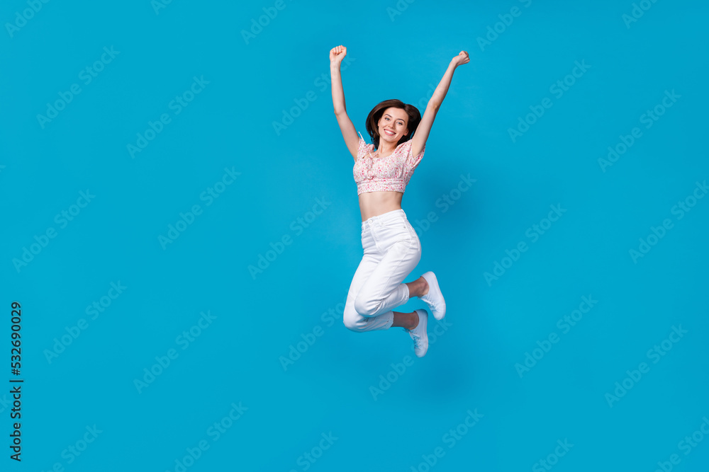 Photo of cute funky joyful lady wear stylish clothes raise hand waited big black friday sale empty space isolated on blue color background