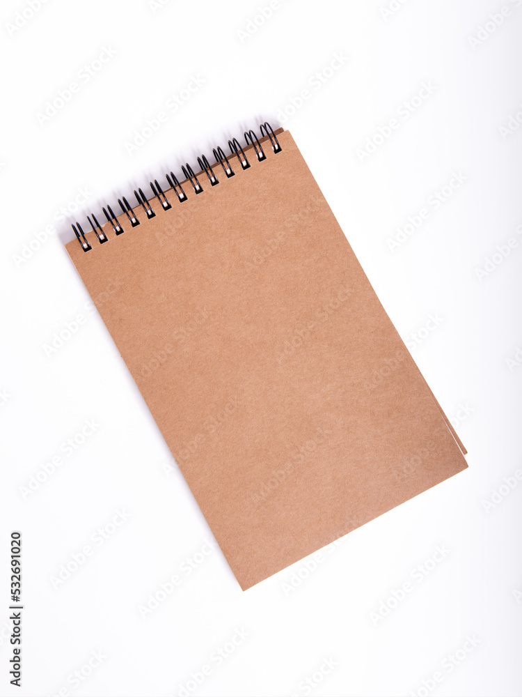 small notebook on a white isolated background. small notebook on a white isolated background.
