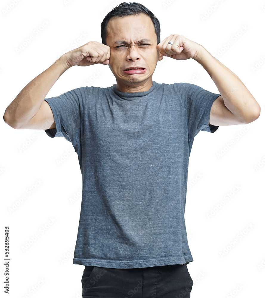 Fototapeta premium crying asian man isolated on studio background