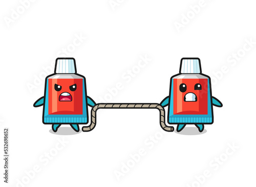 cute toothpaste character is playing tug of war game