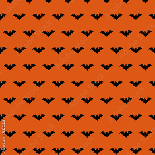 Concept of Halloween pattern with bat. 3d illustration.  Orange background.