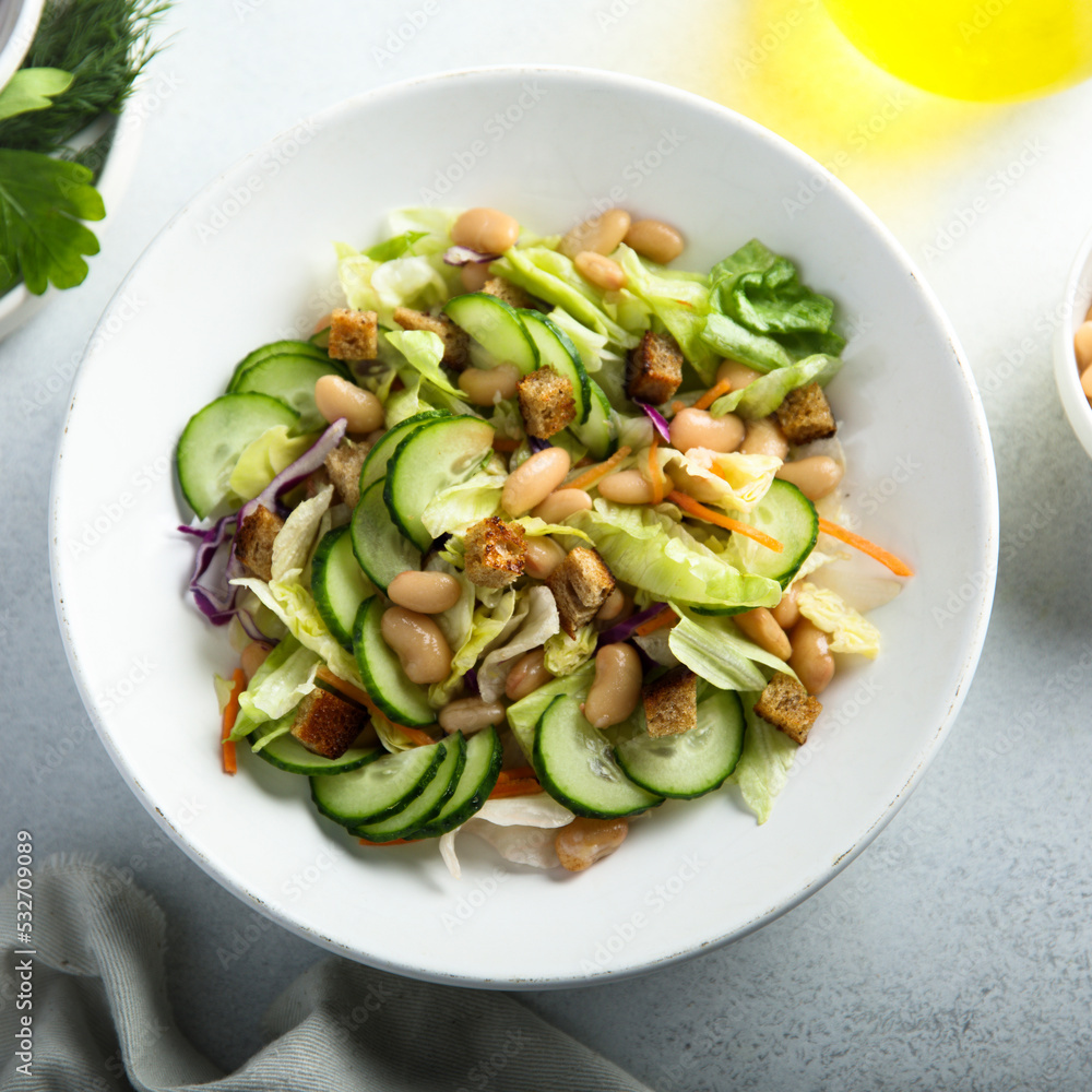 Healthy vegetable salad with white bean Healthy vegetable salad with white bean