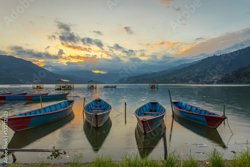 Boats in Phewa Lake at sunset - Pokhara, Nepal