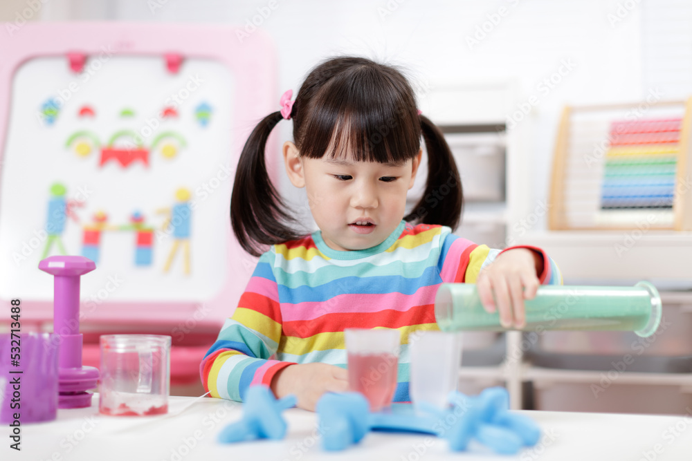 young girl pretend playing food preparing at home young girl pretend playing food preparing at home