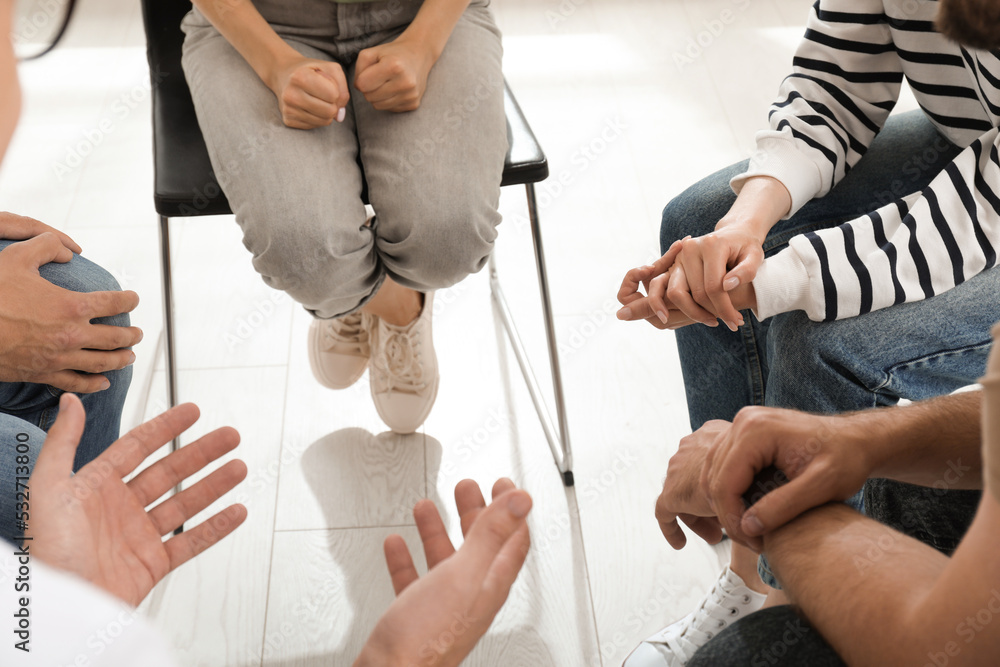 Psychotherapist working with group of drug addicted people at therapy session, closeup Psychotherapist working with group of drug addicted people at therapy session, closeup