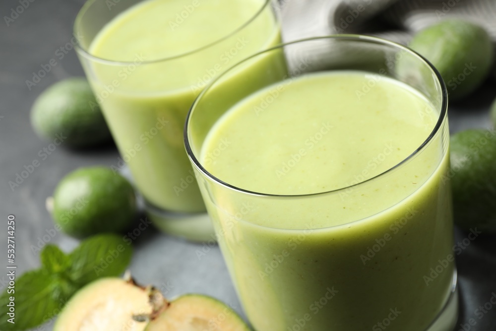 Fresh feijoa smoothie in glass, closeup view Fresh feijoa smoothie in glass, closeup view