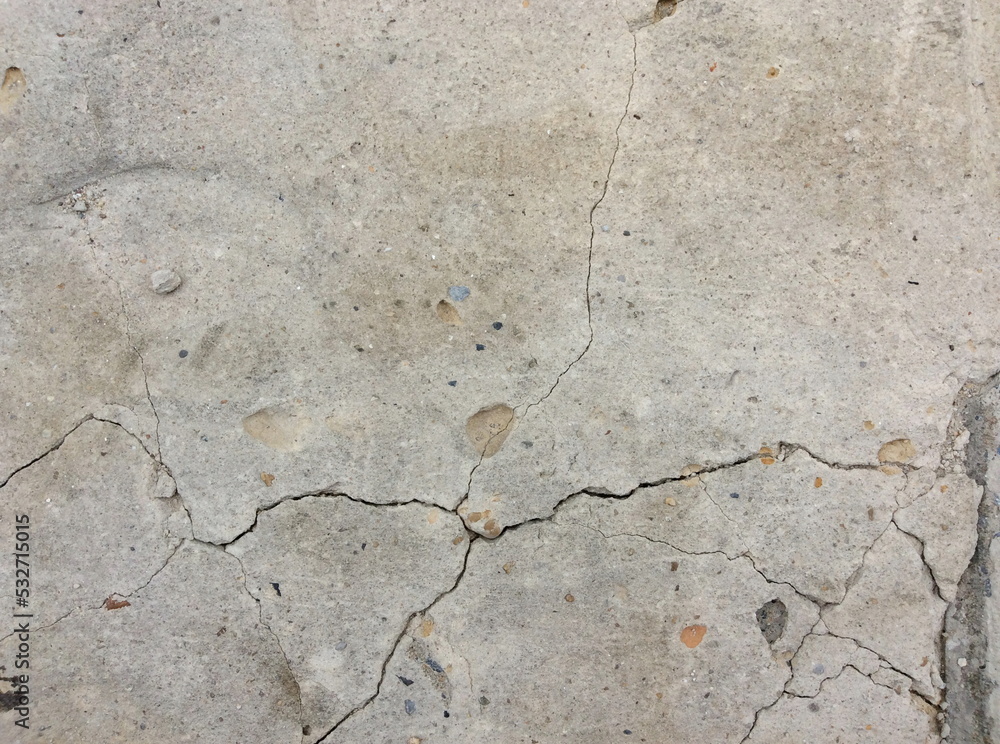 Fototapeta premium Cracked concrete texture closeup background