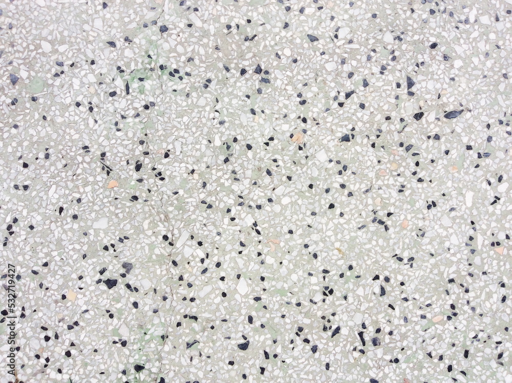 rough texture surface of exposed aggregate finish, Ground stone washed floor, made of small sand stone in light brown color rough texture surface of exposed aggregate finish, Ground stone washed floor, made of small sand stone in light brown color