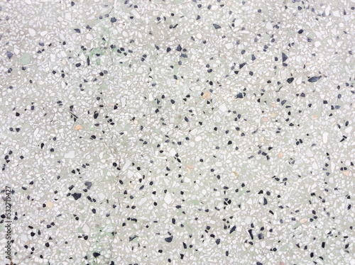 rough texture surface of exposed aggregate finish, Ground stone washed floor, made of small sand stone in light brown color