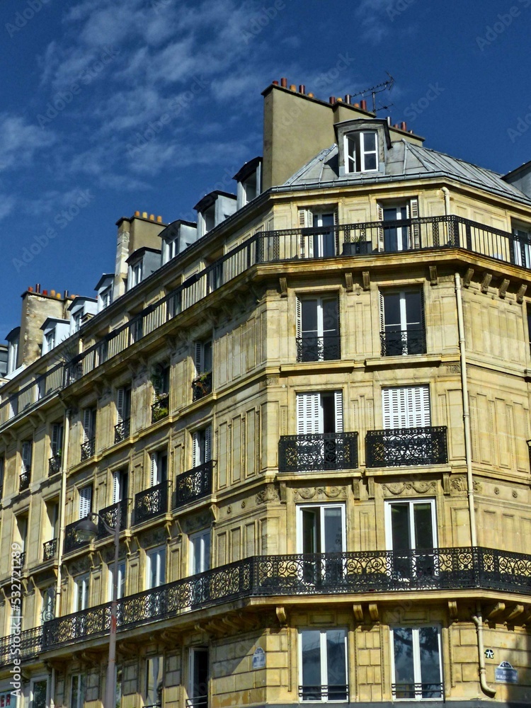 Paris, September 2022 : Visit of the magnificent city of Paris, Capital of France - View on different facades of buildings built by Baron Haussmann	