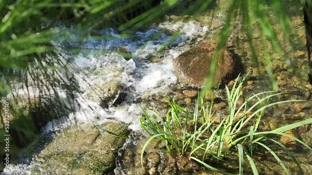 mountain waterfall. water flows down in a torrent. strong current. mountain waterfall. water flows down in a torrent. strong current.