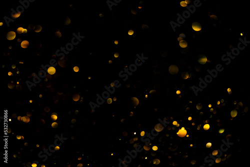 Golden glitter bokeh sparkles lights dark abstract texture overlay background