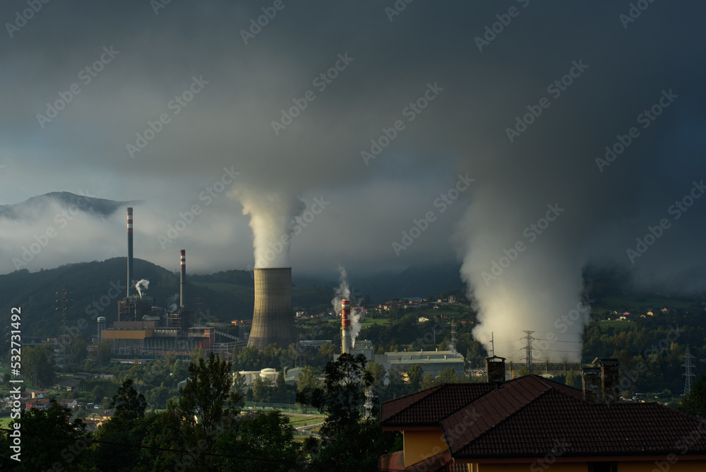 thermal power plant emitting large amounts of steam and fumes into the sky. Ecology and Environment. Industry and sustainability