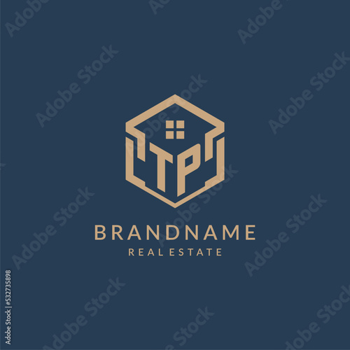 Initial letter TP hexagonal house roof shape icon logo design