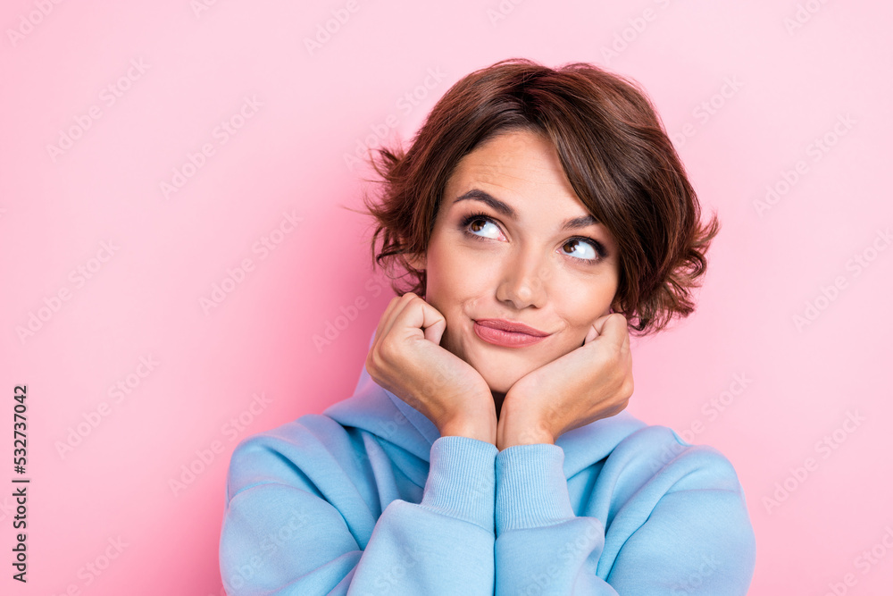Closeup photo of young attractive gorgeous nice girl dreamy look curious empty space touch cheeks charming new sale isolated on pink color background Closeup photo of young attractive gorgeous nice girl dreamy look curious empty space touch cheeks charming new sale isolated on pink color background
