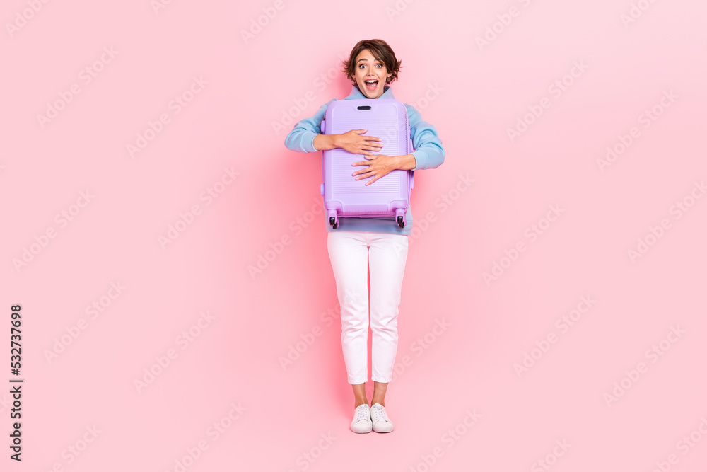 Photo of pretty lady hold bag departure registration low cost rejoice vacation dream relax resort rest isolated on pink color background Photo of pretty lady hold bag departure registration low cost rejoice vacation dream relax resort rest isolated on pink color background