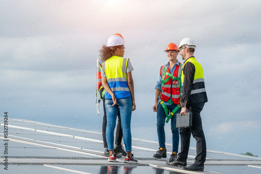 Engineer team working on replacement solar panel in solar power plant,Ecological,Using natural renewable energy.