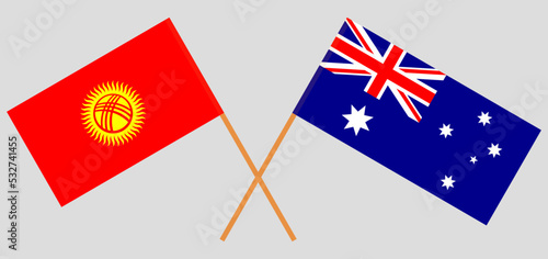 Crossed flags of Kyrgyzstan and Australia. Official colors. Correct proportion