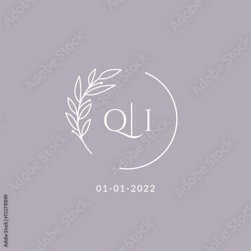 Initial monogram QI wedding logo with decorative floral frame