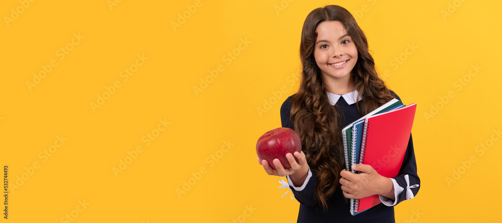 teen girl hold apple after study. healthy childhood. happy kid going to do homework. Banner of schoolgirl student. School child pupil portrait with copy space. teen girl hold apple after study. healthy childhood. happy kid going to do homework. Banner of schoolgirl student. School child pupil portrait with copy space.