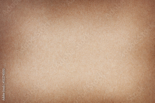 Background old brown paper parchment texture with a slightly rough texture 