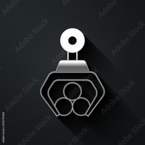 Silver Grapple crane grabbed a log icon isolated on black background. Forest industry. Industrial crane for lumber trunk wood production. Long shadow style. Vector