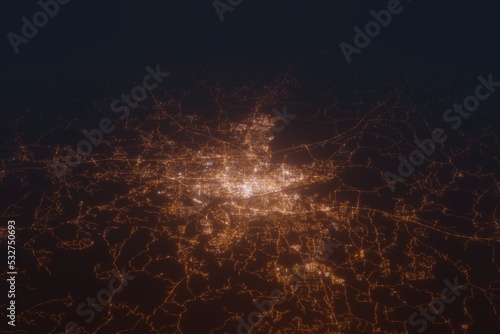 Aerial shot of Tuscaloosa (Alabama, USA) at night, view from north. Imitation of satellite view on modern city with street lights and glow effect. 3d render photo