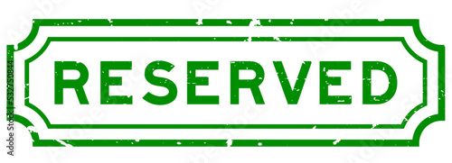 Grunge green reserved word rubber seal stamp on white background