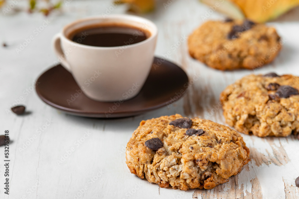 Coffee served with chocolate biscuits Coffee served with chocolate biscuits