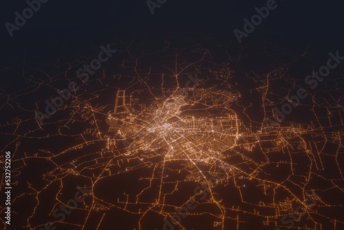 Aerial shot on Tartu (Estonia) at night, view from west. Imitation of satellite view on modern city with street lights and glow effect. 3d render