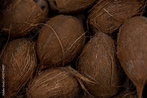 Close-up of brown coconut with texture. On the store counter