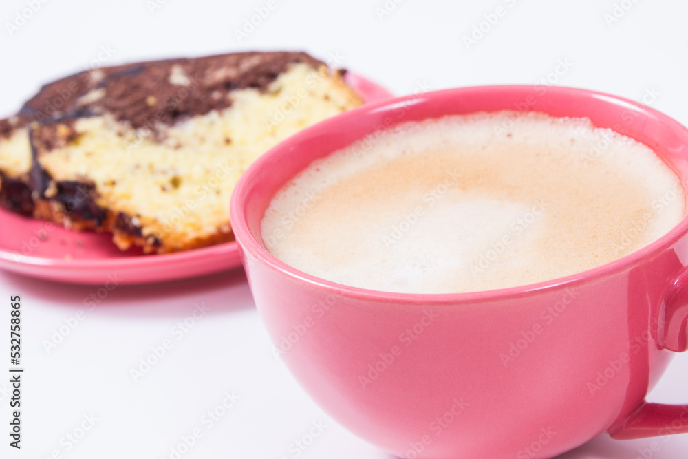 Coffee with milk and fresh yeast dough with cocoa and chocolate icing. Delicious dessert. White background Coffee with milk and fresh yeast dough with cocoa and chocolate icing. Delicious dessert. White background