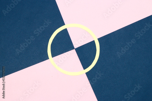circle in the middle of the background divided into 4 parts, pink-blue-pink-blue, creative design, part of

