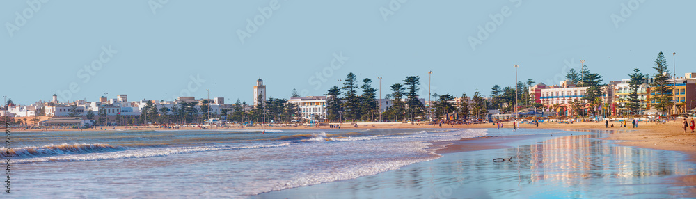 General view of the city beach with holidaymakers on the beach - Essaouira, Morocco